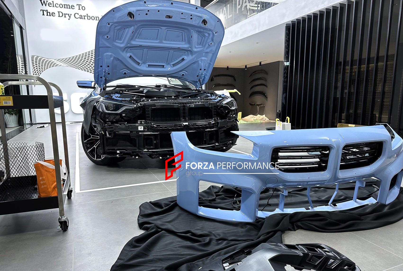 CARBON BODY KIT FOR BMW M2/M2C G87  Set includes:  Front Lip Front Vent Covers Front Canards Rear Diffuser Rear Spoiler Rear Canards Skit plate Side Skirts  Side Canards Mirror Covers