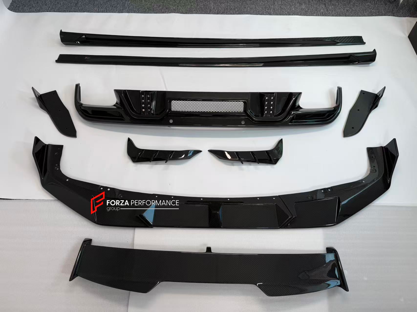 CARBON BODY KIT for BMW X6M F96 2020+

Set includes:

Front Lip

Side Skirts
Wing Spoiler
Rear Diffuser Assembly

Material: Carbon

NOTE: Professional installation is required