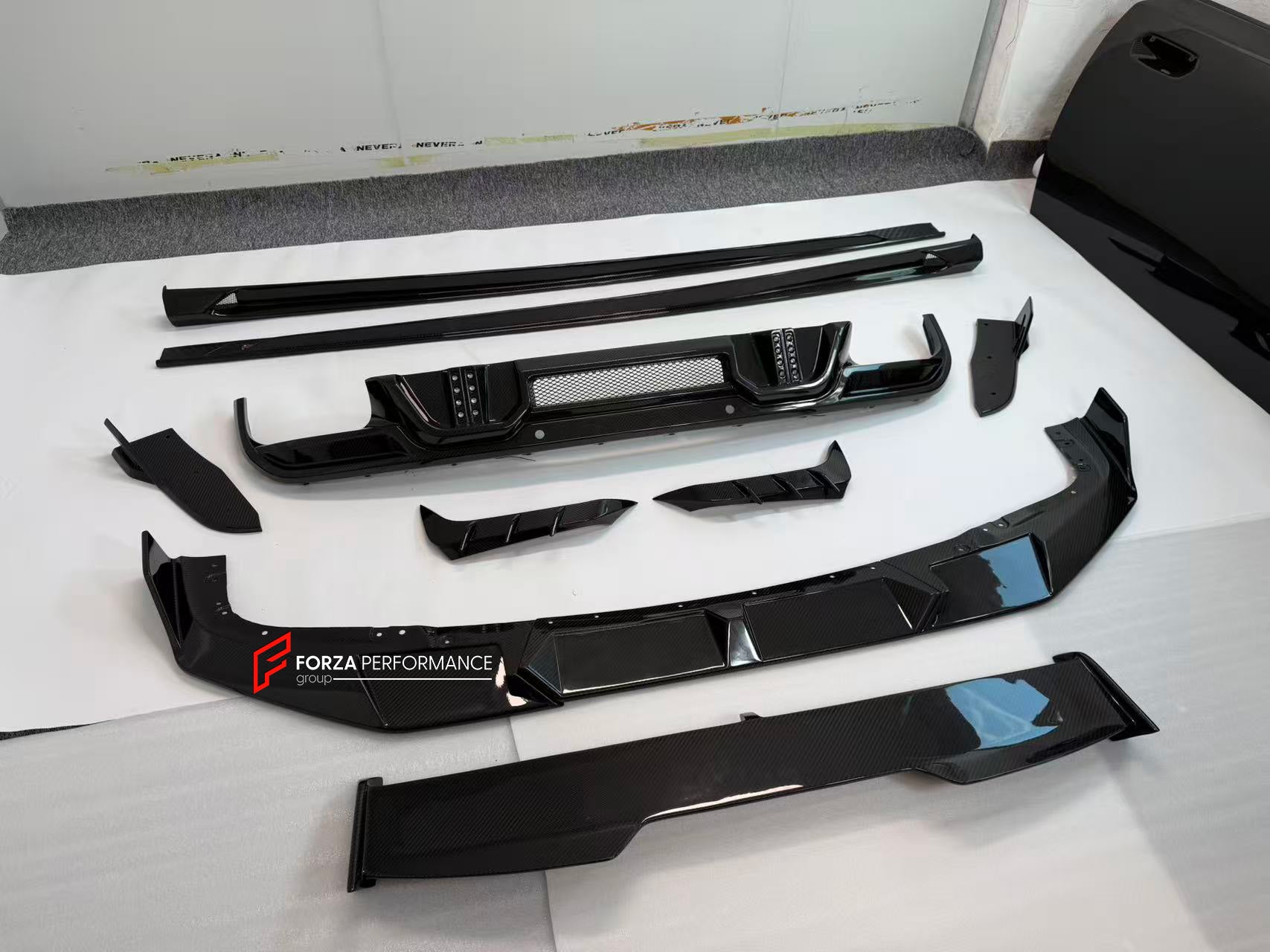 CARBON BODY KIT for BMW X6M F96 2020+

Set includes:

Front Lip

Side Skirts
Wing Spoiler
Rear Diffuser Assembly

Material: Carbon

NOTE: Professional installation is required