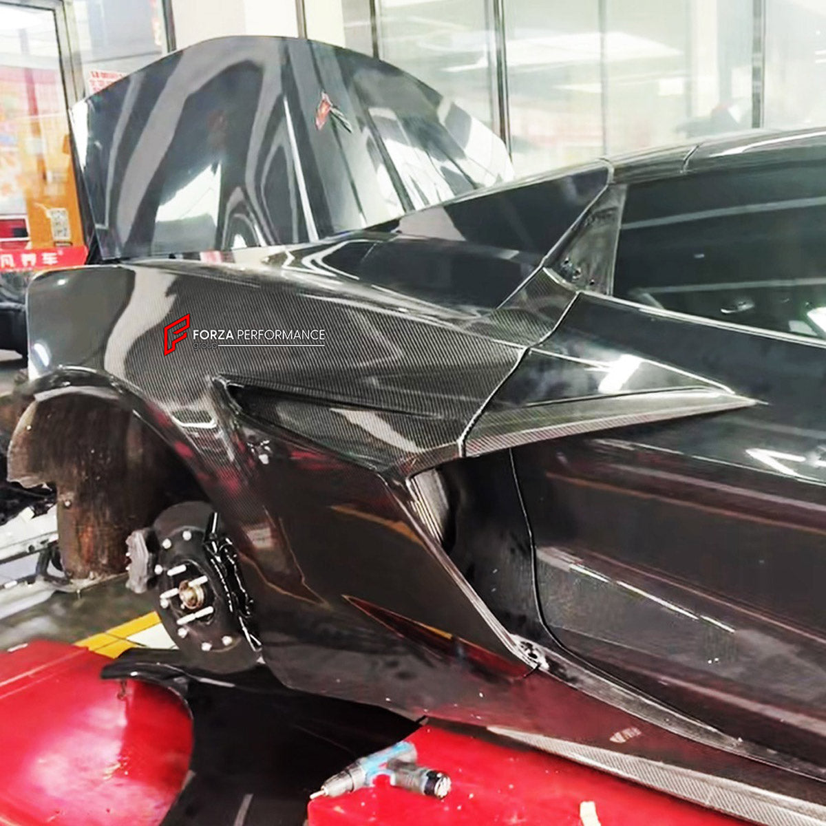 CARBON BODY KIT for Chevrolet Corvette C8 Z06 2020+
Set includes:

Front Lip
Hood Bonnet
Engine Cover
Engine Cover Lid
Rear Spoiler Wing
Rear Fenders
Rear Bumper Assembly
Rear Diffuser
Material: Carbon

NOTE: Professional installation is required.