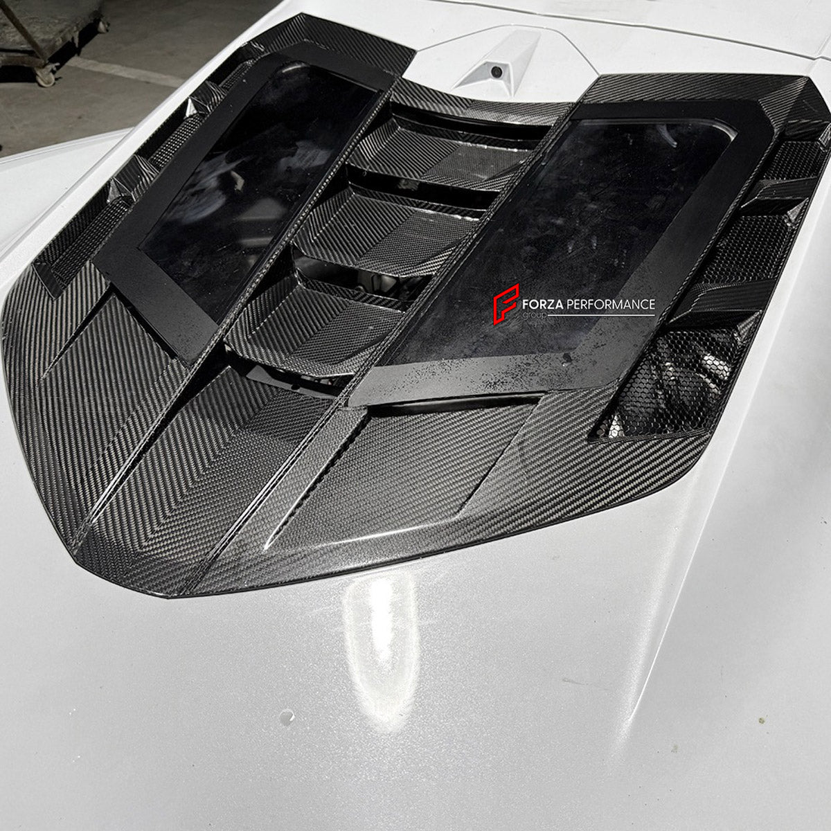 CARBON BODY KIT for Chevrolet Corvette C8 Z06 2020+
Set includes:

Front Lip
Hood Bonnet
Engine Cover
Engine Cover Lid
Rear Spoiler Wing
Rear Fenders
Rear Bumper Assembly
Rear Diffuser
Material: Carbon

NOTE: Professional installation is required.