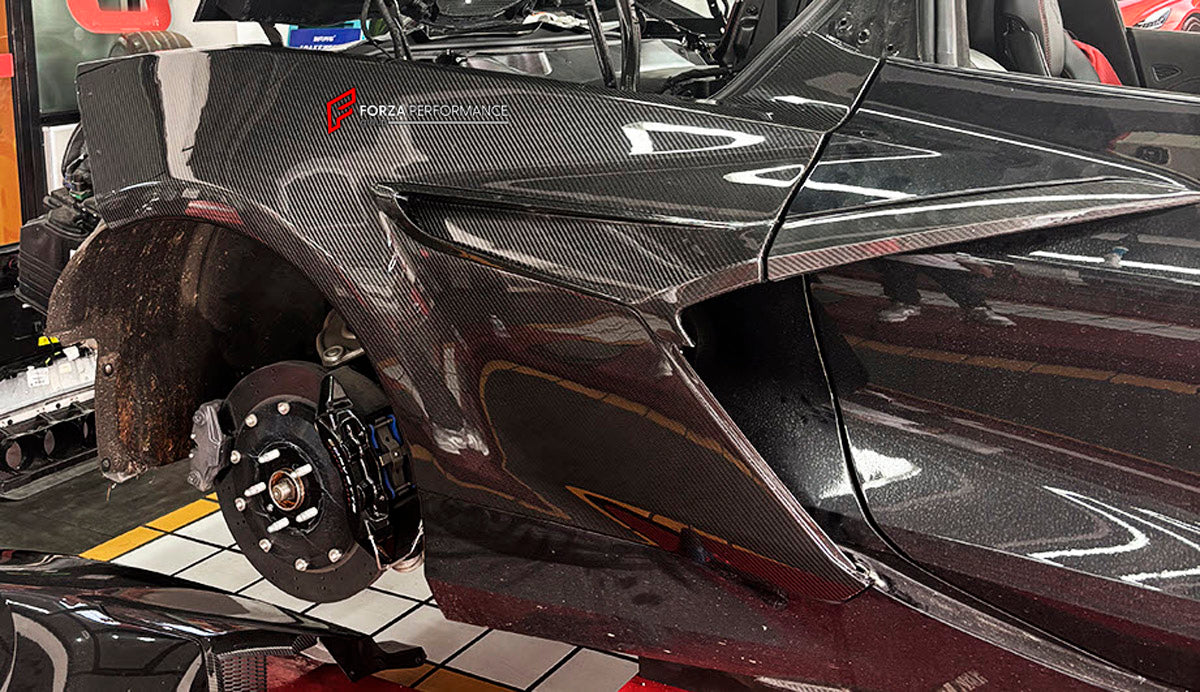 CARBON BODY KIT for Chevrolet Corvette C8 Z06 2020+
Set includes:

Front Lip
Hood Bonnet
Engine Cover
Engine Cover Lid
Rear Spoiler Wing
Rear Fenders
Rear Bumper Assembly
Rear Diffuser
Material: Carbon

NOTE: Professional installation is required.