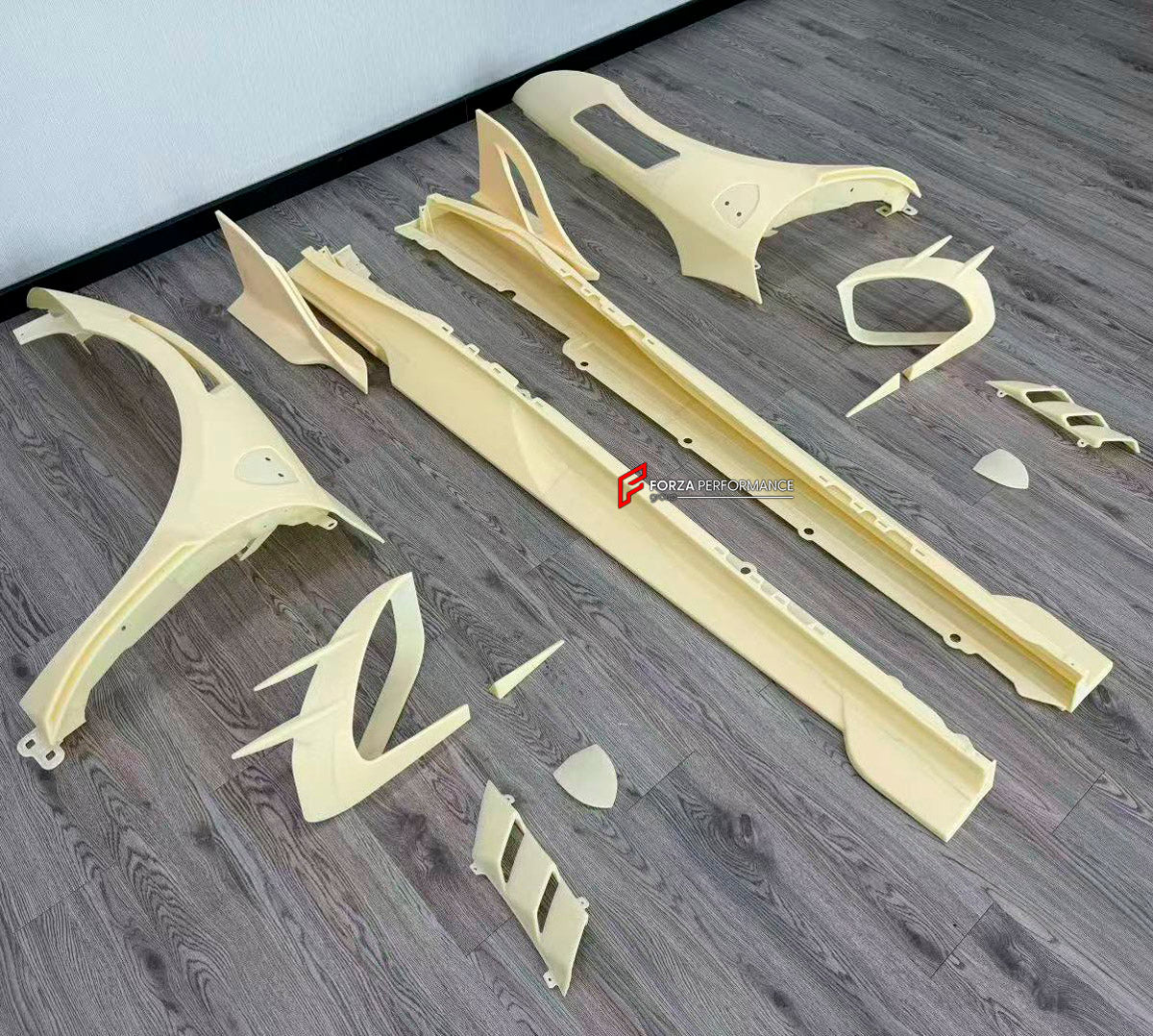 CARBON BODY KIT for FERRARI 296 GTB 2022+ FORZA PERFORMANCE custom fit Mansory
Set includes:

Front Fenders
Front Fender Vents
Front Fenders Emblem Logo
Side Skirts
Rear Fenders Vents
Material: Carbon

NOTE: Professional installation is required.