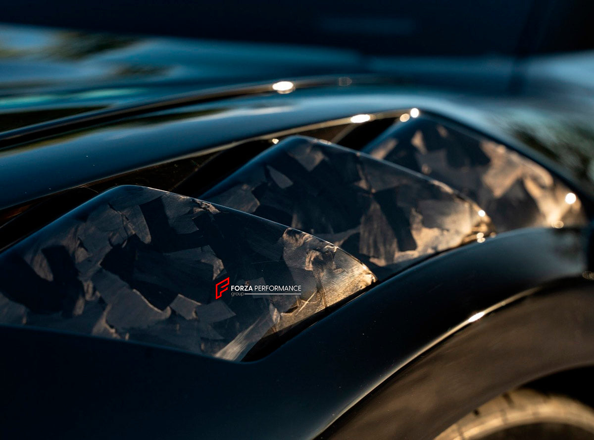 CARBON BODY KIT for FERRARI 296 GTB 2022+ FORZA PERFORMANCE custom fit Mansory
Set includes:

Front Fenders
Front Fender Vents
Front Fenders Emblem Logo
Side Skirts
Rear Fenders Vents
Material: Carbon

NOTE: Professional installation is required.
