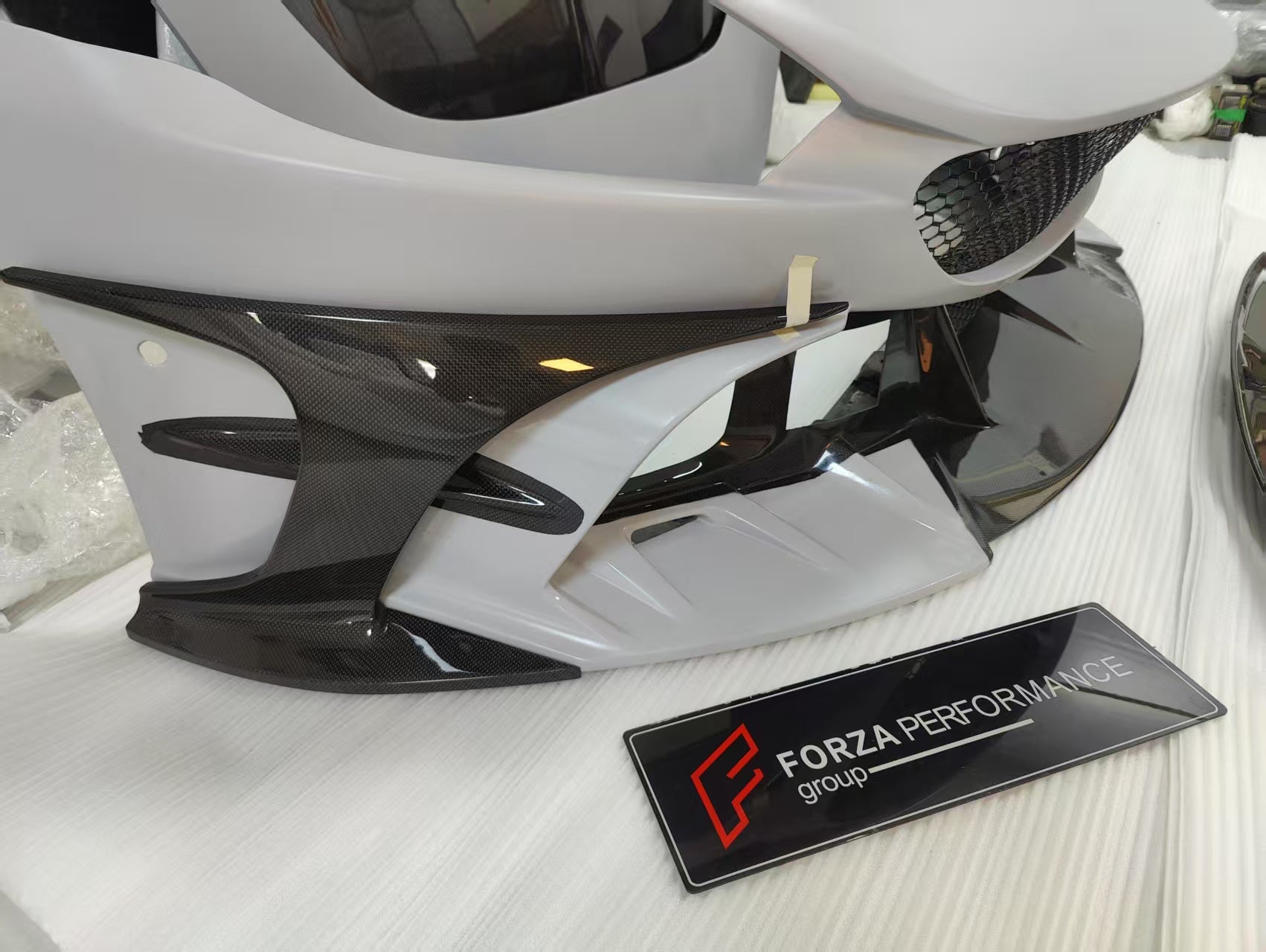 CARBON BODY KIT for FERRARI ROMA

Set includes:

Front Bumper
Front Grille
Hood / Bonnet
Side Mirror Covers
Side Trims
Side Skirts
Trunk Panel
Rear Spoiler

Rear Diffuser

Material: Carbon Fiber

Note: Professional installation is required.