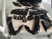 CARBON BODY KIT for Lamborghini Urus 2018+
Set includes:

Front Bumper
Front Bimper Fins
Front Lip
Hood Bonnet
Side Mirror Covers
Front Fenders
Front Fender Vents
Side Skirts
Rear Fenders
Roof Spoiler
Rear Spoiler Wing
Rear Bumper
Rear Diffuser
Material: Carbon

NOTE: Professional installation is required.