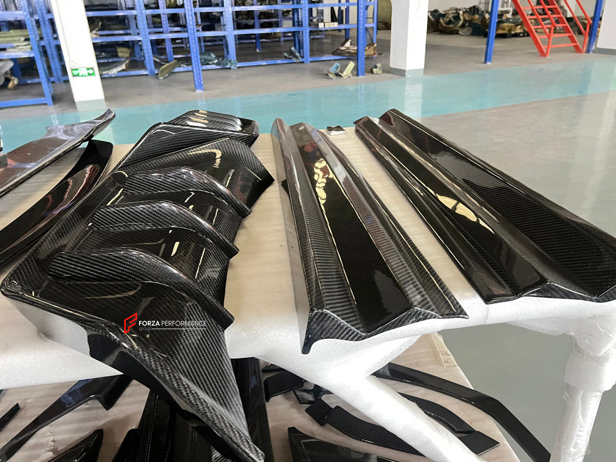 CARBON BODY KIT for Lamborghini Urus 2018+
Set includes:

Front Bumper
Front Bimper Fins
Front Lip
Hood Bonnet
Side Mirror Covers
Front Fenders
Front Fender Vents
Side Skirts
Rear Fenders
Roof Spoiler
Rear Spoiler Wing
Rear Bumper
Rear Diffuser
Material: Carbon

NOTE: Professional installation is required.