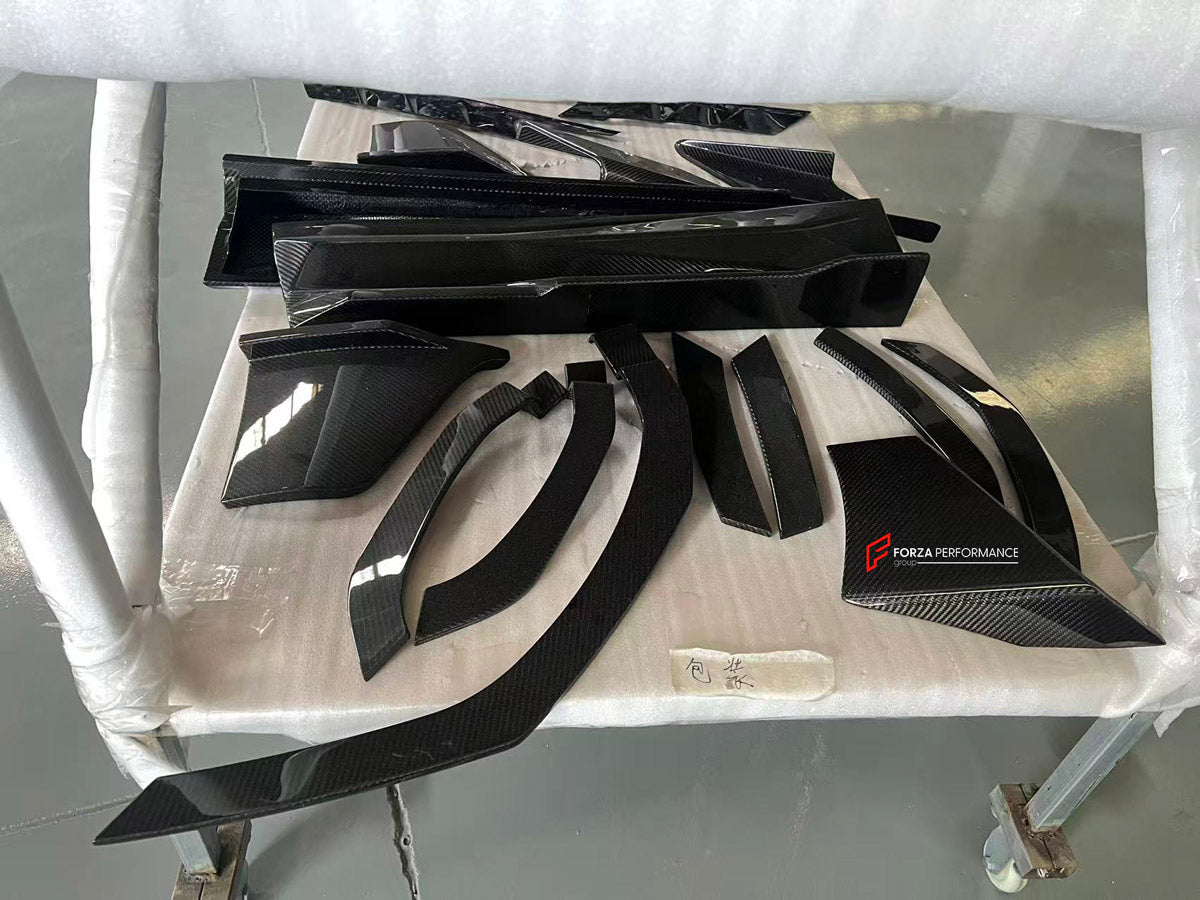 CARBON BODY KIT for Lamborghini Urus 2018+
Set includes:

Front Bumper
Front Bimper Fins
Front Lip
Hood Bonnet
Side Mirror Covers
Front Fenders
Front Fender Vents
Side Skirts
Rear Fenders
Roof Spoiler
Rear Spoiler Wing
Rear Bumper
Rear Diffuser
Material: Carbon

NOTE: Professional installation is required.