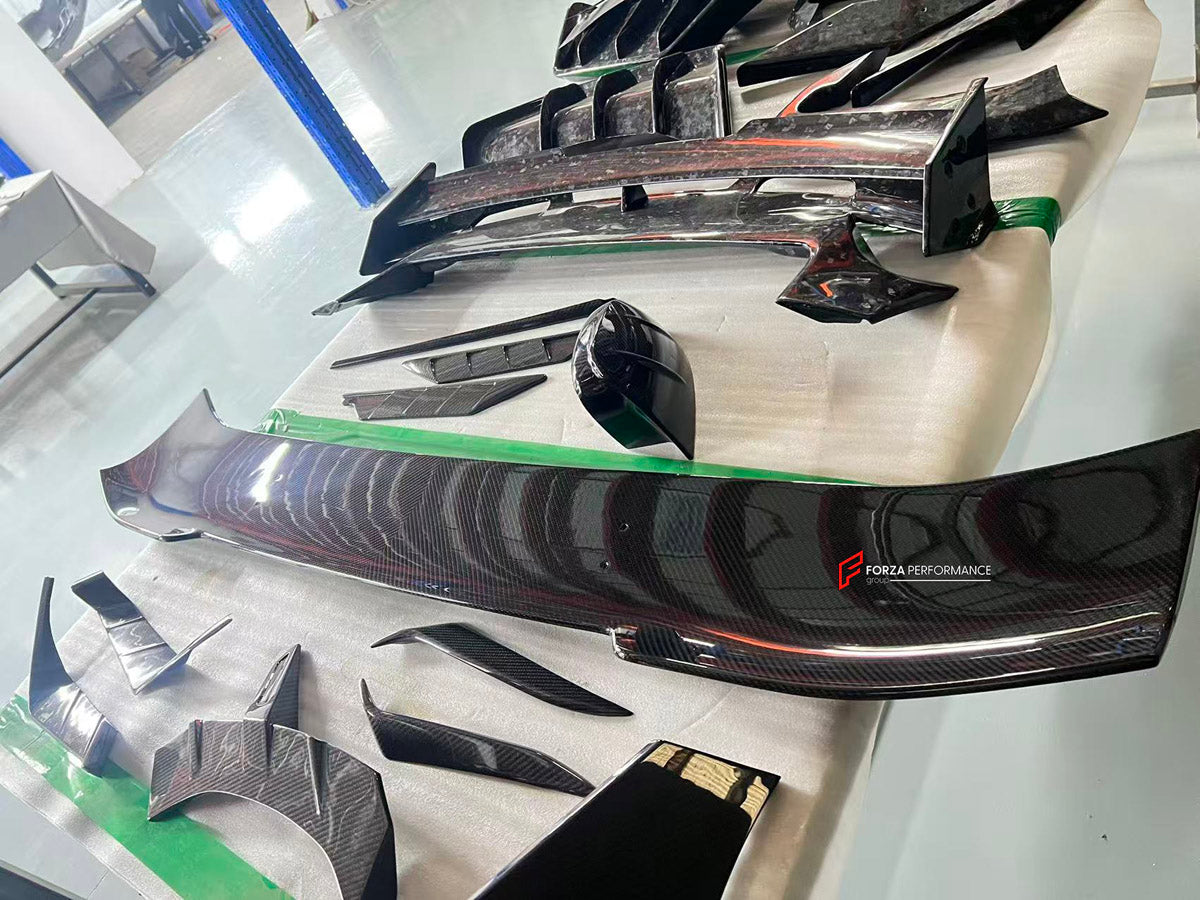 CARBON BODY KIT for Lamborghini Urus 2018+
Set includes:

Front Bumper
Front Bimper Fins
Front Lip
Hood Bonnet
Side Mirror Covers
Front Fenders
Front Fender Vents
Side Skirts
Rear Fenders
Roof Spoiler
Rear Spoiler Wing
Rear Bumper
Rear Diffuser
Material: Carbon

NOTE: Professional installation is required.