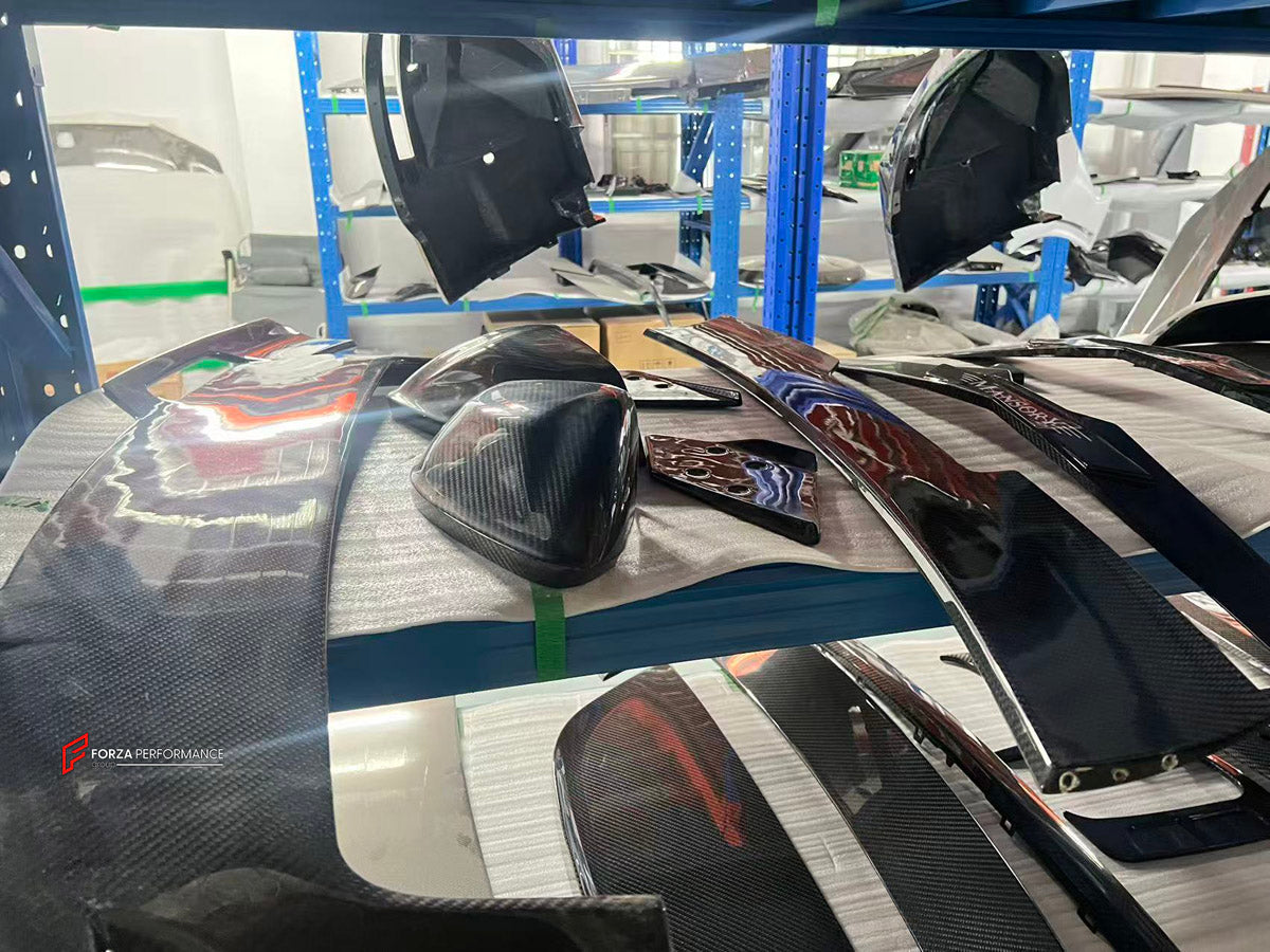 CARBON BODY KIT for Lamborghini Urus 2018+
Set includes:

Front Bumper
Front Bimper Fins
Front Lip
Hood Bonnet
Side Mirror Covers
Front Fenders
Front Fender Vents
Side Skirts
Rear Fenders
Roof Spoiler
Rear Spoiler Wing
Rear Bumper
Rear Diffuser
Material: Carbon

NOTE: Professional installation is required.