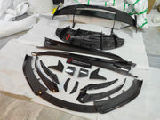 CARBON BODY KIT for LOTUS EMIRA

Set includes:

Roof
Hood
Front Lip
Front Bumper Air Vents
Front Canards
Rear Fender Air Vents
Side Skirts
Rear Diffuser
Rear Spoiler
Rear Spoiler Cover
Door Pedals
Engine Hood Cover
Rear Air Duct
Side Mirrors
Engine Grille

Material: Carbon