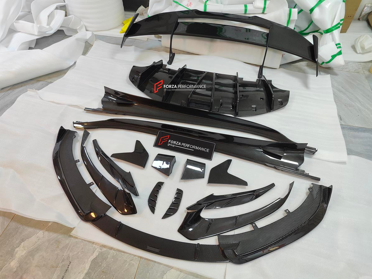 CARBON BODY KIT for LOTUS EMIRA

Set includes:

Roof
Hood
Front Lip
Front Bumper Air Vents
Front Canards
Rear Fender Air Vents
Side Skirts
Rear Diffuser
Rear Spoiler
Rear Spoiler Cover
Door Pedals
Engine Hood Cover
Rear Air Duct
Side Mirrors
Engine Grille

Material: Carbon