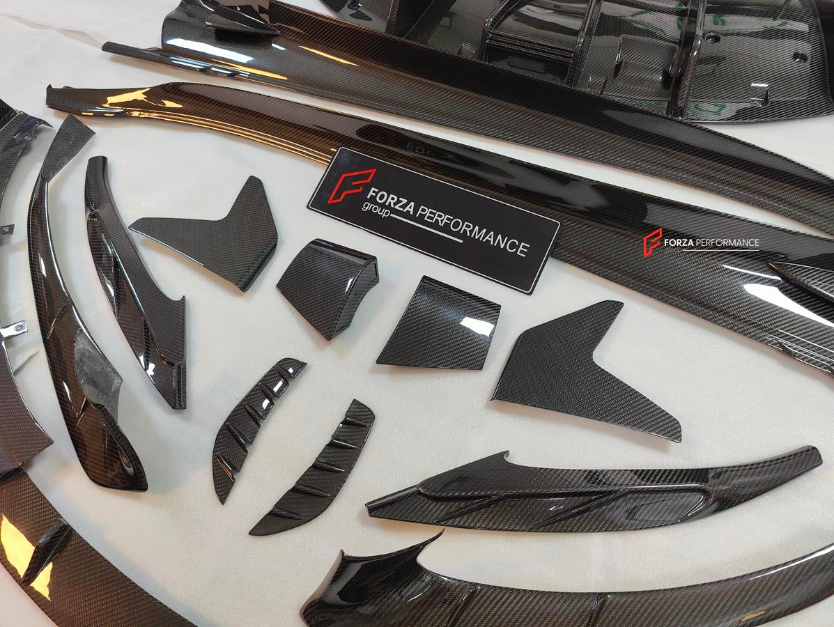 CARBON BODY KIT for LOTUS EMIRA

Set includes:

Roof
Hood
Front Lip
Front Bumper Air Vents
Front Canards
Rear Fender Air Vents
Side Skirts
Rear Diffuser
Rear Spoiler
Rear Spoiler Cover
Door Pedals
Engine Hood Cover
Rear Air Duct
Side Mirrors
Engine Grille

Material: Carbon
