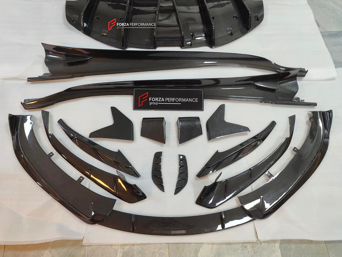 CARBON BODY KIT for LOTUS EMIRA

Set includes:

Roof
Hood
Front Lip
Front Bumper Air Vents
Front Canards
Rear Fender Air Vents
Side Skirts
Rear Diffuser
Rear Spoiler
Rear Spoiler Cover
Door Pedals
Engine Hood Cover
Rear Air Duct
Side Mirrors
Engine Grille

Material: Carbon