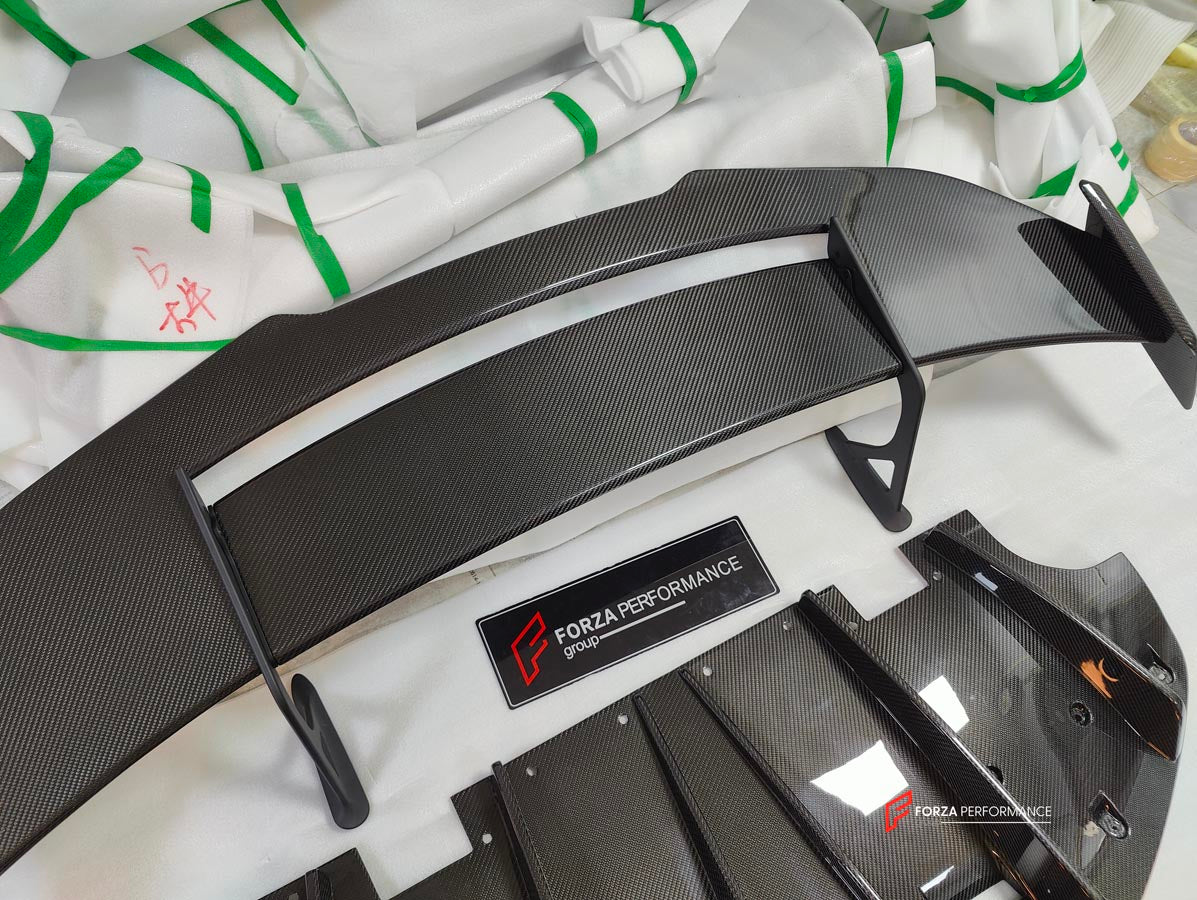 CARBON BODY KIT for LOTUS EMIRA

Set includes:

Roof
Hood
Front Lip
Front Bumper Air Vents
Front Canards
Rear Fender Air Vents
Side Skirts
Rear Diffuser
Rear Spoiler
Rear Spoiler Cover
Door Pedals
Engine Hood Cover
Rear Air Duct
Side Mirrors
Engine Grille

Material: Carbon