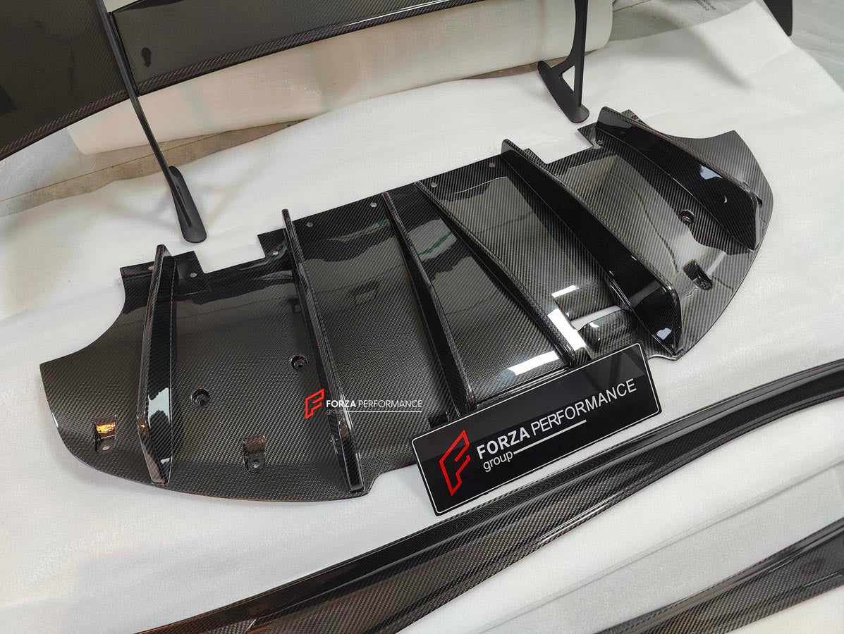 CARBON BODY KIT for LOTUS EMIRA

Set includes:

Roof
Hood
Front Lip
Front Bumper Air Vents
Front Canards
Rear Fender Air Vents
Side Skirts
Rear Diffuser
Rear Spoiler
Rear Spoiler Cover
Door Pedals
Engine Hood Cover
Rear Air Duct
Side Mirrors
Engine Grille

Material: Carbon