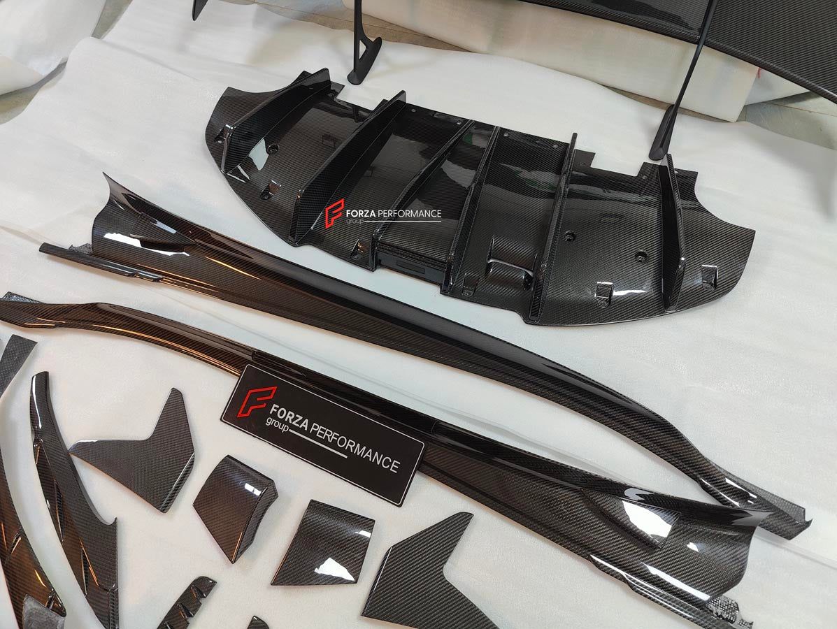 CARBON BODY KIT for LOTUS EMIRA

Set includes:

Roof
Hood
Front Lip
Front Bumper Air Vents
Front Canards
Rear Fender Air Vents
Side Skirts
Rear Diffuser
Rear Spoiler
Rear Spoiler Cover
Door Pedals
Engine Hood Cover
Rear Air Duct
Side Mirrors
Engine Grille

Material: Carbon