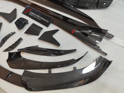 CARBON BODY KIT for LOTUS EMIRA

Set includes:

Roof
Hood
Front Lip
Front Bumper Air Vents
Front Canards
Rear Fender Air Vents
Side Skirts
Rear Diffuser
Rear Spoiler
Rear Spoiler Cover
Door Pedals
Engine Hood Cover
Rear Air Duct
Side Mirrors
Engine Grille

Material: Carbon
