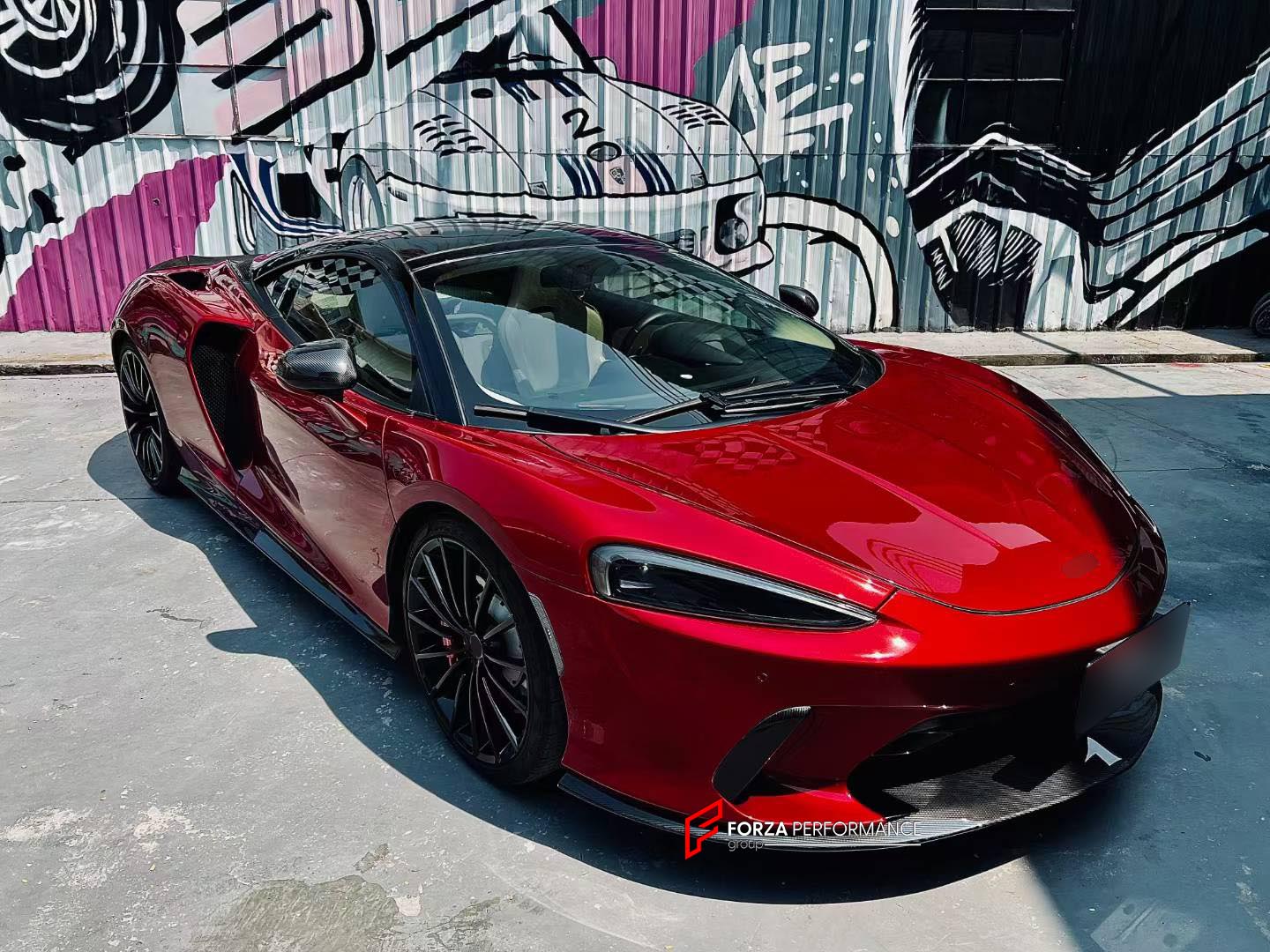 DRY CARBON BODY KIT for MCLAREN GT 2019 - 2024
Set includes:

Front Lip
Front Bumper Air Intake Trims
Side Mirror Covers
Side Skirts
Side Air Vents
Rear Diffuser
Ducktail Spoiler
Material: Dry Carbon

NOTE: Professional installation is required