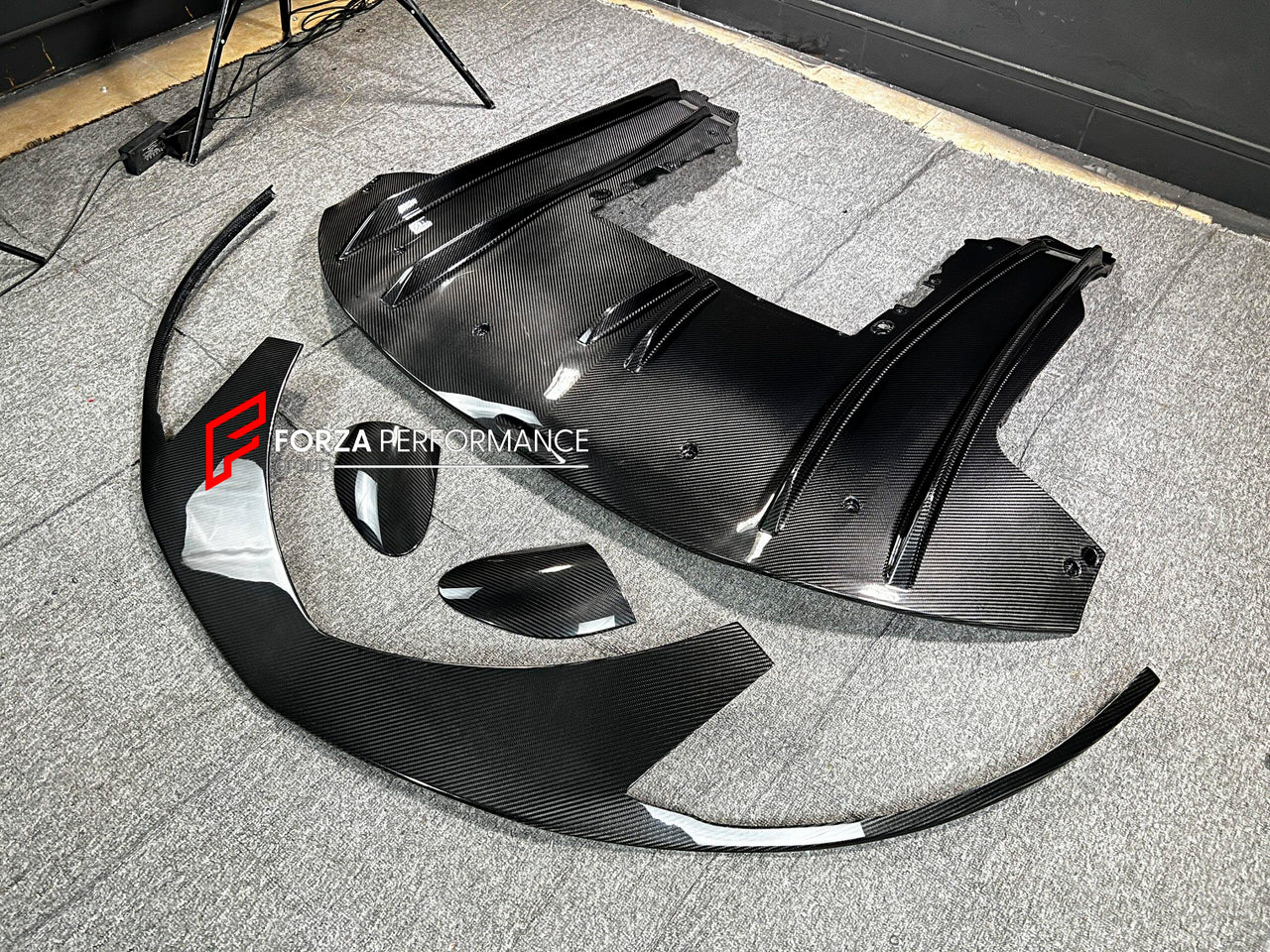 DRY CARBON BODY KIT for MCLAREN GT 2019 - 2024
Set includes:

Front Lip
Front Bumper Air Intake Trims
Side Mirror Covers
Side Skirts
Side Air Vents
Rear Diffuser
Ducktail Spoiler
Material: Dry Carbon

NOTE: Professional installation is required