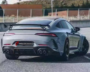 CARBON BODY KIT for MERCEDES-BENZ AMG GT43 GT50 GT53 GT63 S X290 4-DOOR COUPE 2018+ FORZA PERFORMANCE custom fit B900 Style

Set includes:
Front Lip
Front Bumper Assembly
Front Grille
Front Fenders
Fender Flares
Side Skirts
Rear Fenders
Rear Spoiler Wing
Rear Diffuser
Exhaust Tips

Material: Carbon

NOTE: Professional installation is required.