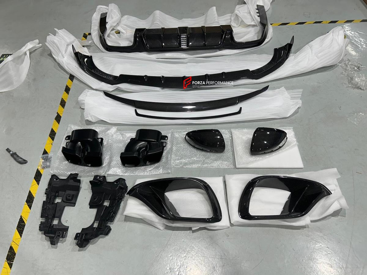 CARBON BODY KIT for MERCEDES BENZ E CLASS E63 AMG W213 2017 - 2020
Set includes:

Front Lip
Front Bumper Air Vents
Mirror Covers
Engine Cover
Rear Diffuser With LED Light
Rear Spoiler
Exhaust Tips
Material: Carbon

NOTE: Professional installation is required.