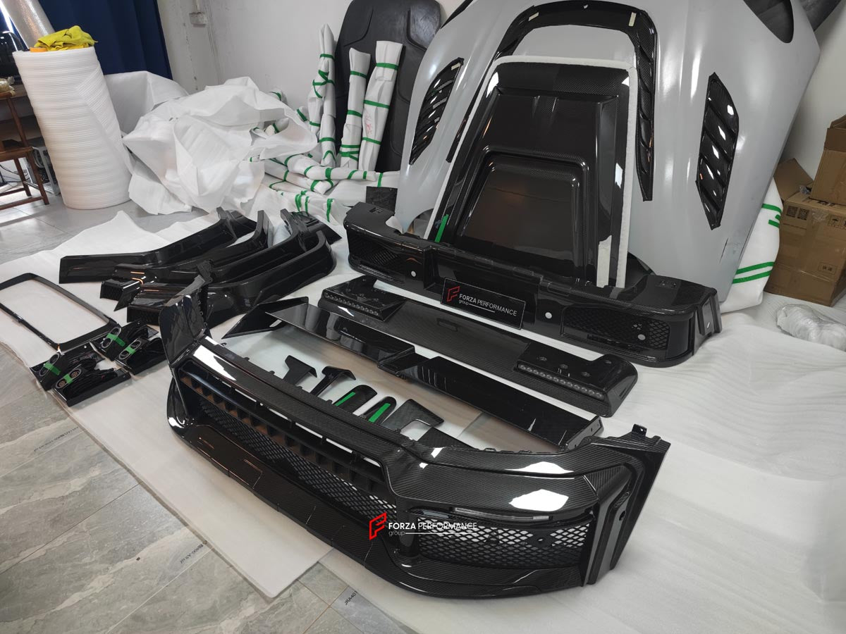 CARBON BODY KIT for MERCEDES-BENZ G-CLASS G63 W465 2024+

Set includes:

Front Bumper Assembly
Front Grille
Hood / Bonnet
Front Fenders
Rear Spoiler
Rear Fender Flares
Rear Bumper

Material: Carbon Fiber