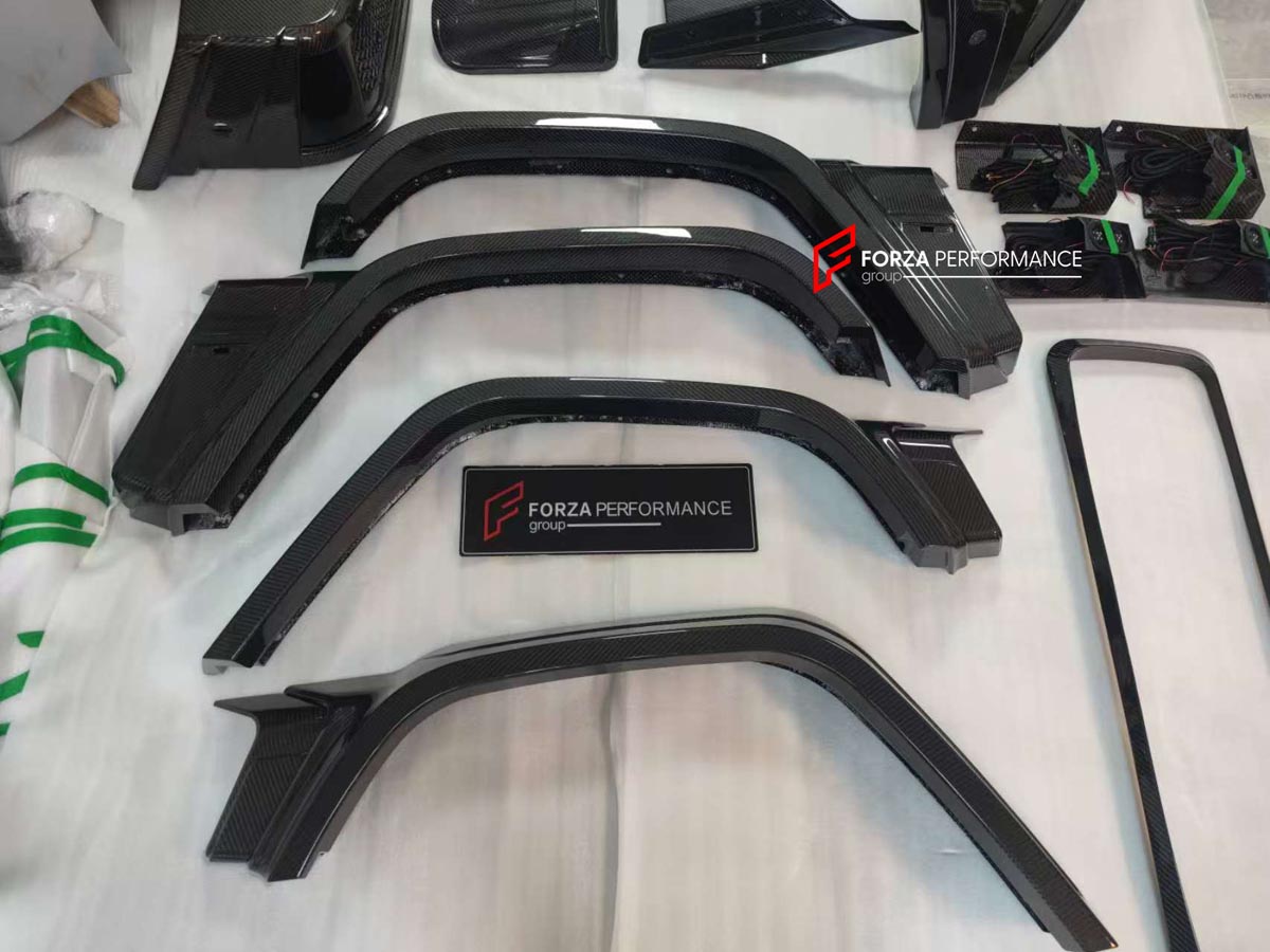 CARBON BODY KIT for MERCEDES-BENZ G-CLASS G63 W465 2024+

Set includes:

Front Bumper Assembly
Front Grille
Hood / Bonnet
Front Fenders
Rear Spoiler
Rear Fender Flares
Rear Bumper

Material: Carbon Fiber