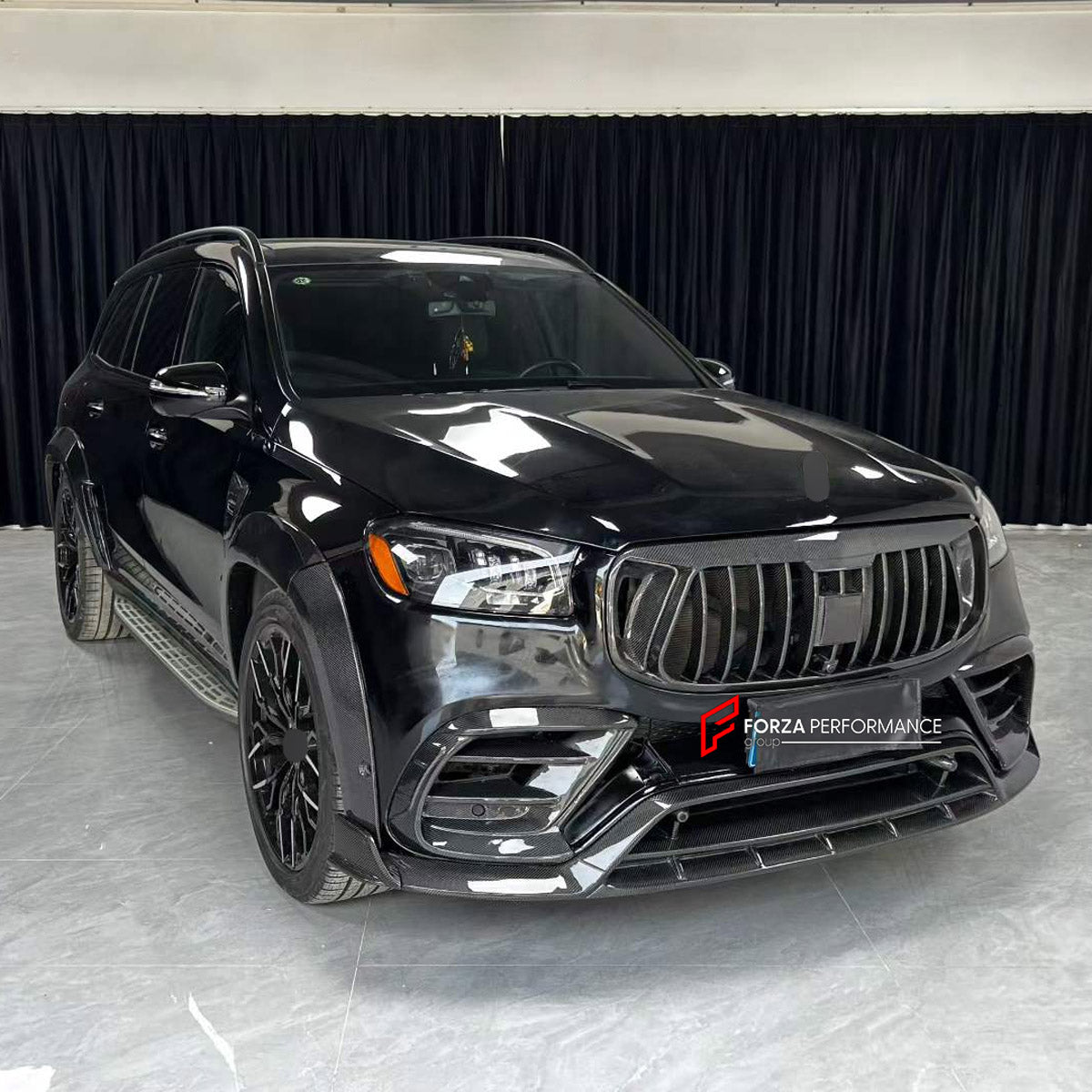 CARBON BODY KIT for MERCEDES-BENZ GLS-CLASS AMG X167 GLS63 2020 - 2023 FORZA PERFORMANCE custom fit Mansory Style

Set includes:
Front Lip
Front Bumper Air Vent Covers
Front Grille
Side Fender Vents
Fender Flares
Roof Spoiler
Rear Bumper Fins
Rear Diffuser
Exhaust Tips

Material: Carbon

NOTE: Professional installation is required.