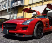 CARBON BODY KIT for Mercedes Benz SLS AMG W197 2010 - 2015
Set includes:

Front Lip
Side Mirror Covers
Side Fender Air Vents
Side Skirts
Rear Spoiler Wing
Rear Diffuser
Material: Carbon

NOTE: Professional installation is required.