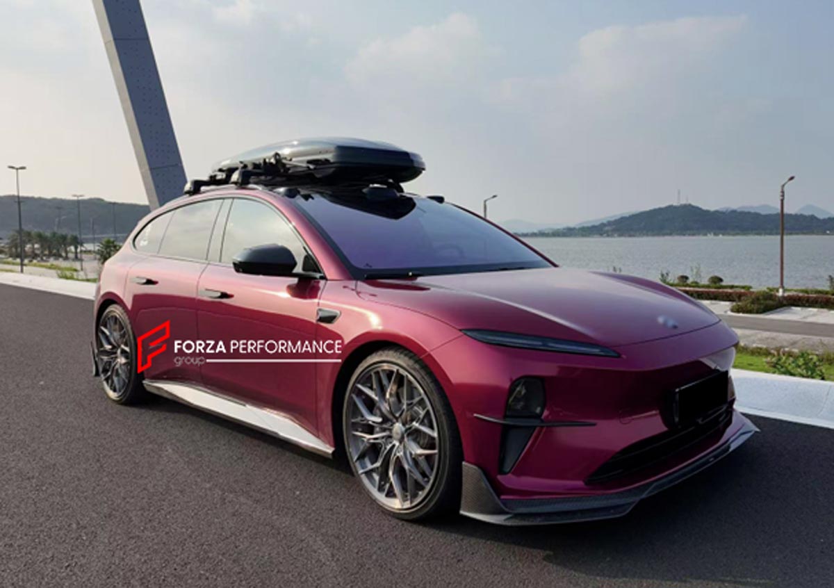 Carbon Body Kit for Nio ET5T 2023+
Set includes:

Front Lip
Side Skirts
Diffuser
Roof Spoiler
Material: Carbon (Can be made in Forged Carbon)

NOTE: Professional installation is required.