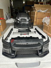 CARBON BODY KIT for NISSAN GT-R R35 2007 - 2025 FORZA PERFORMANCE custom fit Nismo Style

Set includes:
Front Lip
Front Bumper Assembly
Hood Bonnet
Side Skirts
Rear Spoiler Wing
Rear Bumper Assembly
Rear Diffuser

Material: Carbon, Plastic

NOTE: Professional installation is required.