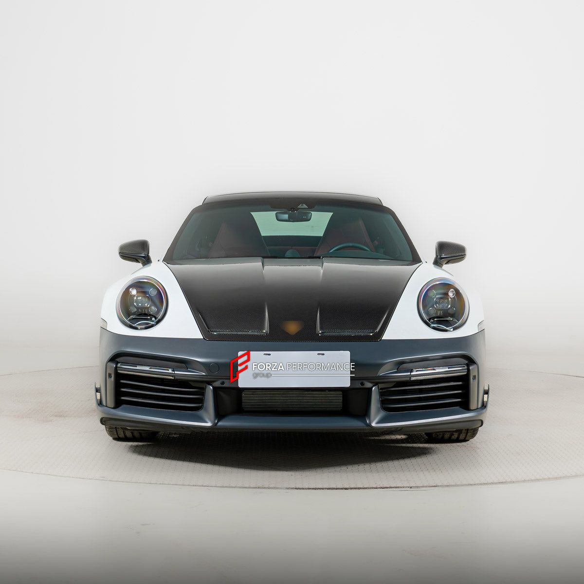 CARBON BODY KIT for PORSCHE 911 992.1 CARRERA 2019 - 2025 FORZA PERFORMANCE custom fit Sport Classic
Set includes:

Front Bumper Assembly
License Plate
Side Skirts
Ducktail Spoiler
Rear Bumper Assembly
Material: Carbon, Plastic

NOTE: Professional installation is required.