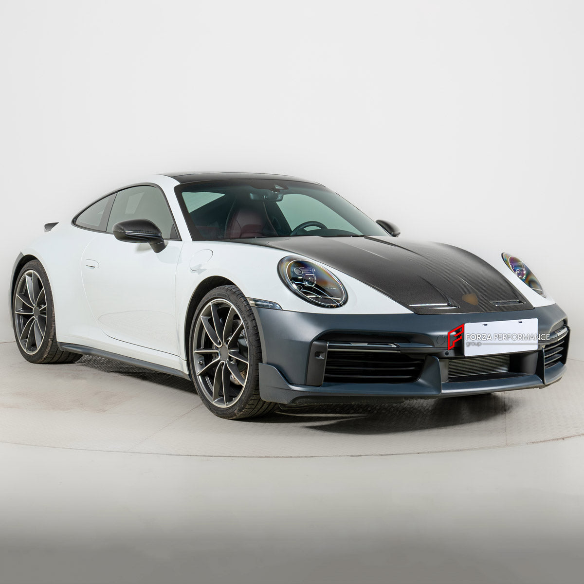 CARBON BODY KIT for PORSCHE 911 992.1 CARRERA 2019 - 2025 FORZA PERFORMANCE custom fit Sport Classic
Set includes:

Front Bumper Assembly
License Plate
Side Skirts
Ducktail Spoiler
Rear Bumper Assembly
Material: Carbon, Plastic

NOTE: Professional installation is required.