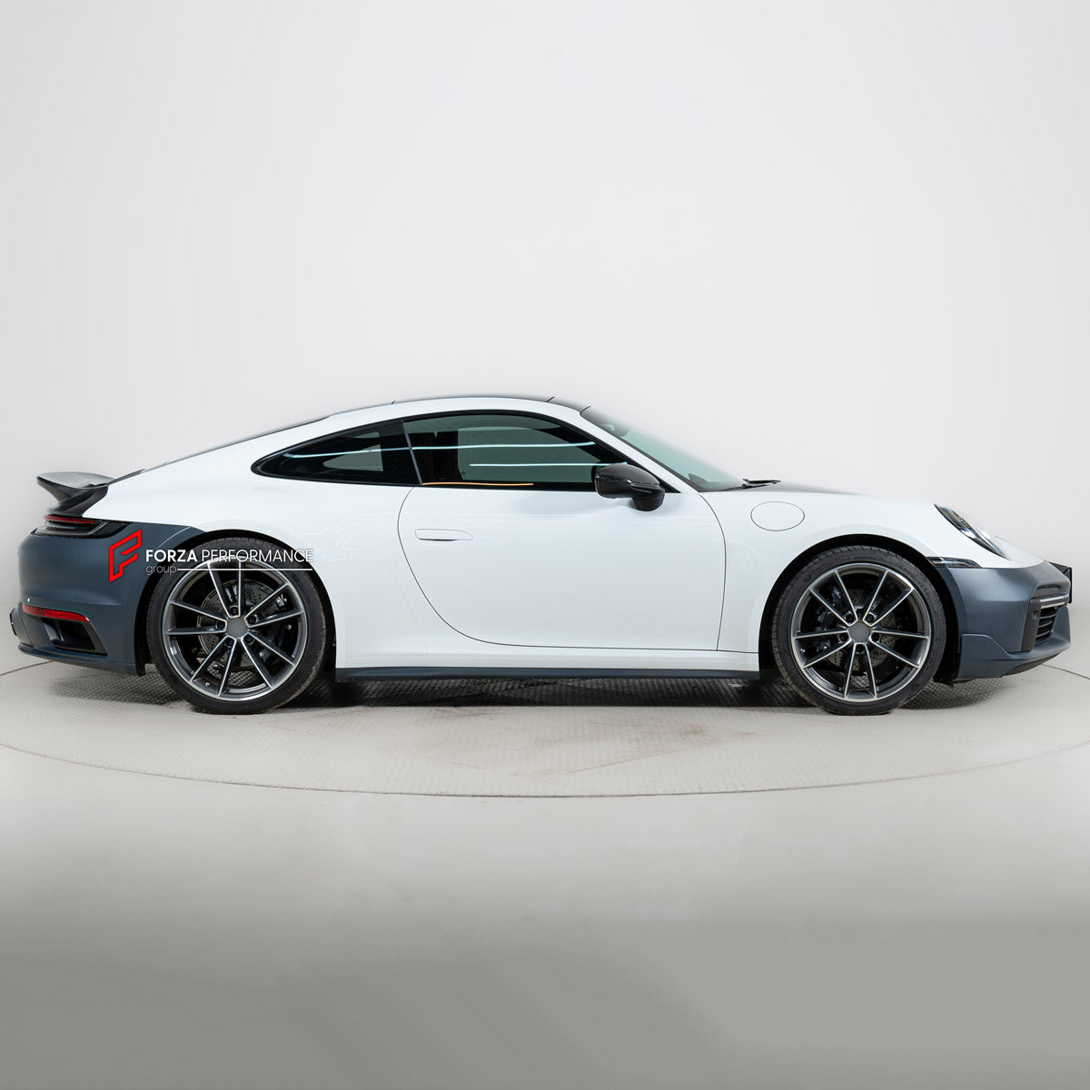 CARBON BODY KIT for PORSCHE 911 992.1 CARRERA 2019 - 2025 FORZA PERFORMANCE custom fit Sport Classic
Set includes:

Front Bumper Assembly
License Plate
Side Skirts
Ducktail Spoiler
Rear Bumper Assembly
Material: Carbon, Plastic

NOTE: Professional installation is required.