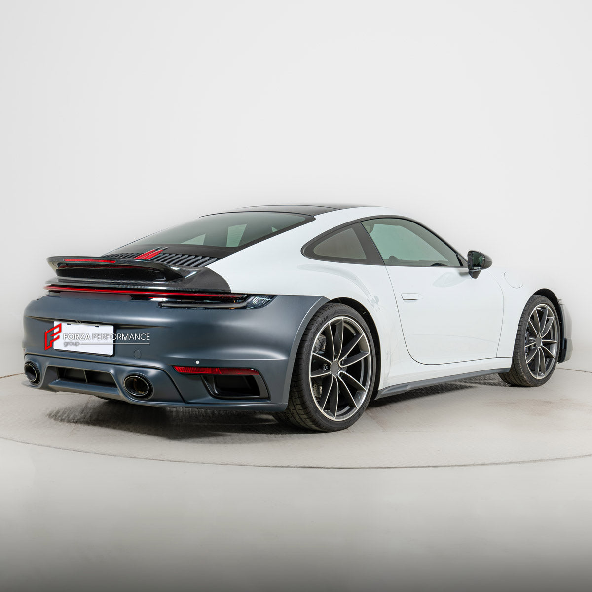 CARBON BODY KIT for PORSCHE 911 992.1 CARRERA 2019 - 2025 FORZA PERFORMANCE custom fit Sport Classic
Set includes:

Front Bumper Assembly
License Plate
Side Skirts
Ducktail Spoiler
Rear Bumper Assembly
Material: Carbon, Plastic

NOTE: Professional installation is required.