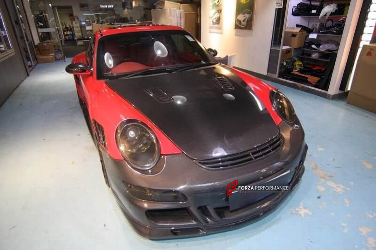 Carbon Body Kit for Porsche 911 997 Turbo
Set includes:

Front Bumper
Hood Bonnet
Side Skirts
Rear Fender Air Scoop
Rear Bumper
Rear Trunk
Rear Spoiler Wing
Material: Carbon

NOTE: Professional installation is required.