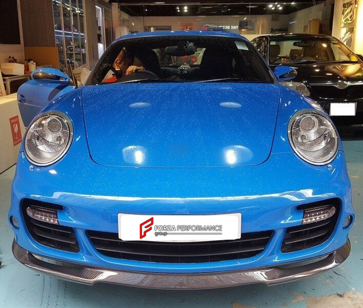 CARBON BODY KIT for Porsche 911 997 Turbo 2004 - 2013
Set includes:

Front Lip
Side Skirts
Rear Diffuser
Material: Carbon

NOTE: Professional installation is required.