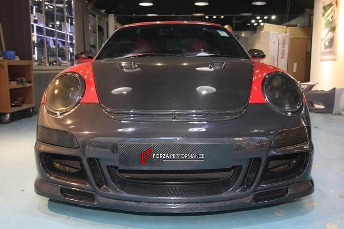 Carbon Body Kit for Porsche 911 997 Turbo
Set includes:

Front Bumper
Hood Bonnet
Side Skirts
Rear Fender Air Scoop
Rear Bumper
Rear Trunk
Rear Spoiler Wing
Material: Carbon

NOTE: Professional installation is required.