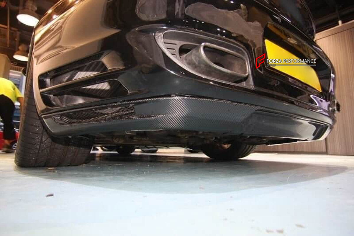 CARBON BODY KIT for Porsche 911 997 Turbo 2004 - 2013
Set includes:

Front Lip
Side Skirts
Rear Diffuser
Material: Carbon

NOTE: Professional installation is required.
