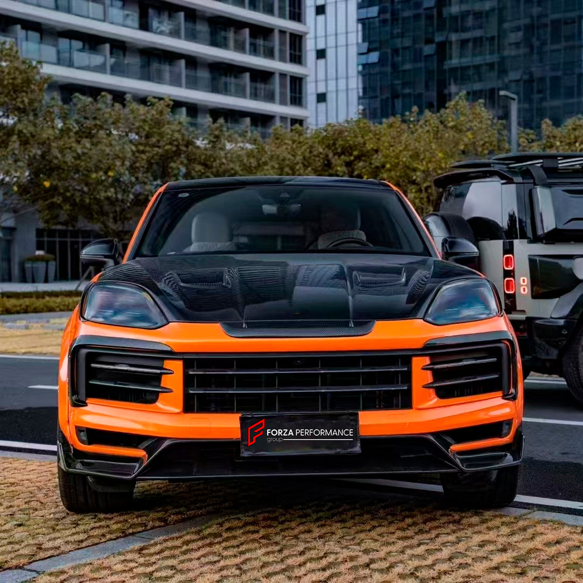 CARBON BODY KIT for Porsche Cayenne 9Y0.2 2024+
Set includes:

Front Lip
Front Bumper Fins
Hood Bonnet
Front Fenders
Front Fender Vents
Side Skirts
Rear Fenders
Roof Spoiler
Rear Diffuser
Material: Carbon

NOTE: Professional installation is required.