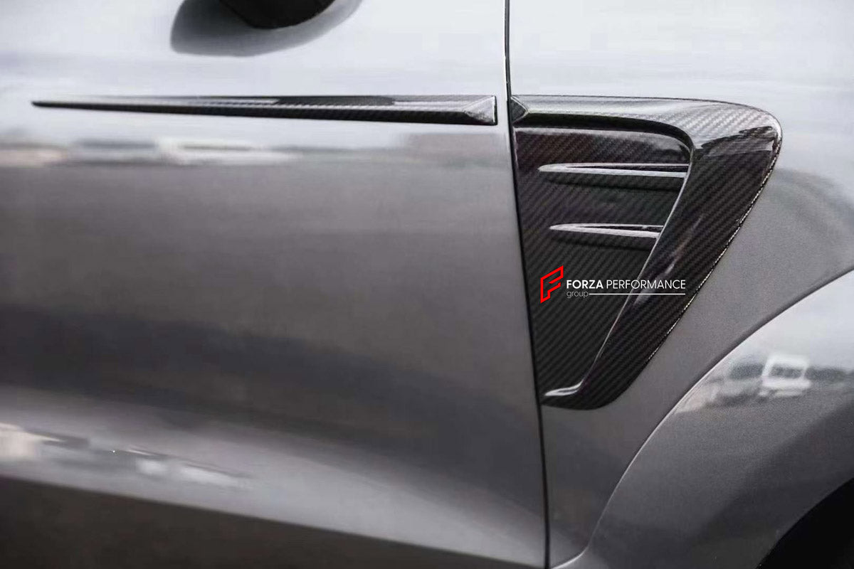 CARBON BODY KIT for PORSCHE CAYENNE E3 9Y 9Y0 9Y3 2017 - 2023 FORZA PERFORMANCE custom fit Mansory Style

Set includes:
Front Lip
Front Bumper Center Trim
Front Grille Mesh Cover Trims
Hood Bonnet
Side Fender Vents
Fender Flares
Side Skirts
Roof Spoiler
Ducktail Spoiler
Rear Bumper Fins
Rear Diffuser
Exhaust Tips

Material: Carbon

NOTE: Professional installation is required.