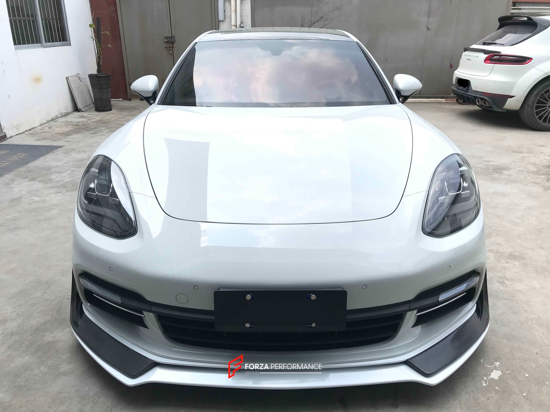 CARBON BODY KIT FOR PORSCHE PANAMERA 971 2017 - 2023

Set includes:

Front Lip
Side skirts
Side Vent
Rear Diffuser
Rear Spoiler

Material: Carbon + Plastic

NOTE: Professional installation is required. Factory LED DRL must be reused