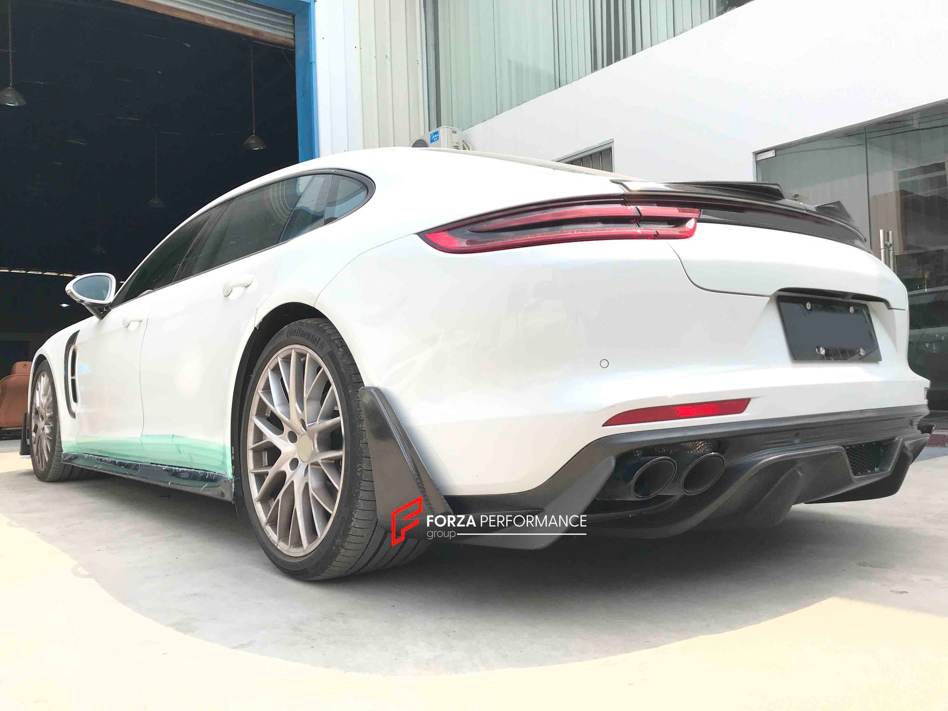 CARBON BODY KIT FOR PORSCHE PANAMERA 971 2017 - 2023

Set includes:

Front Lip
Side skirts
Side Vent
Rear Diffuser
Rear Spoiler

Material: Carbon + Plastic

NOTE: Professional installation is required. Factory LED DRL must be reused