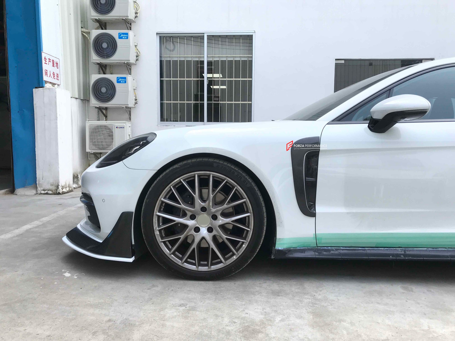CARBON BODY KIT FOR PORSCHE PANAMERA 971 2017 - 2023

Set includes:

Front Lip
Side skirts
Side Vent
Rear Diffuser
Rear Spoiler

Material: Carbon + Plastic

NOTE: Professional installation is required. Factory LED DRL must be reused