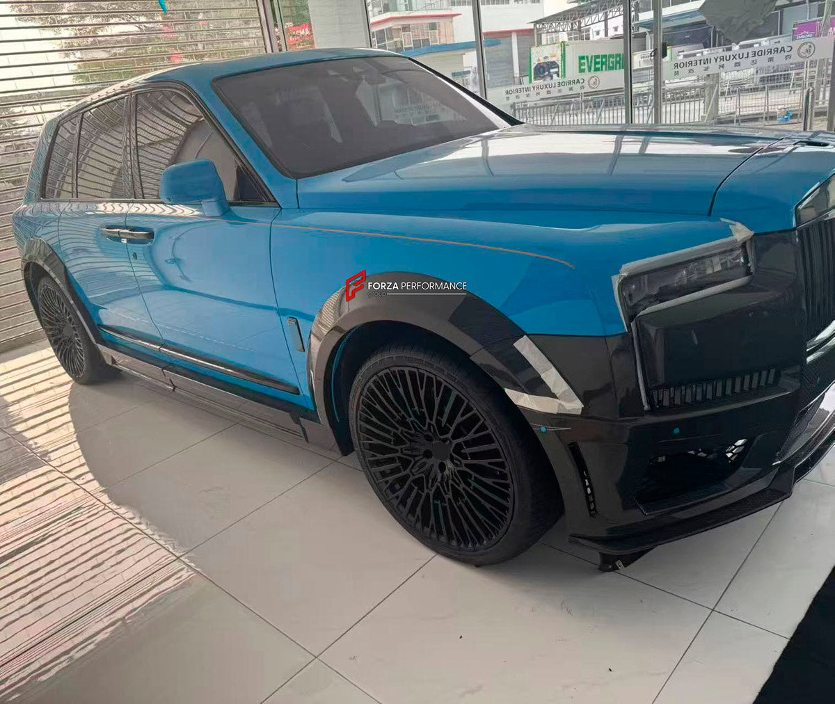CARBON BODY KIT for ROLLS ROYCE CULLINAN 2024+ FORZA PERFORMANCE custom fit 1016
Set includes:

Front Lip
Front Bumper Assembly
Front Fenders Flares
Side Skirts
Body Side Door Moldings
Rear Fenders Flares
Roof Spoiler
Ducktail Spoiler
Rear Diffuser
Material: Carbon

NOTE: Professional installation is required.
