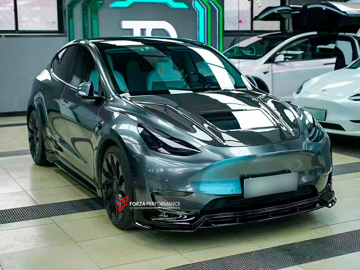 CARBON BODY KIT for TESLA MODEL Y 2020+

Set includes:

Front Lip
Hood
Rear Spoiler
Rear Diffuser

Material: Carbon

Note: Professional installation is required