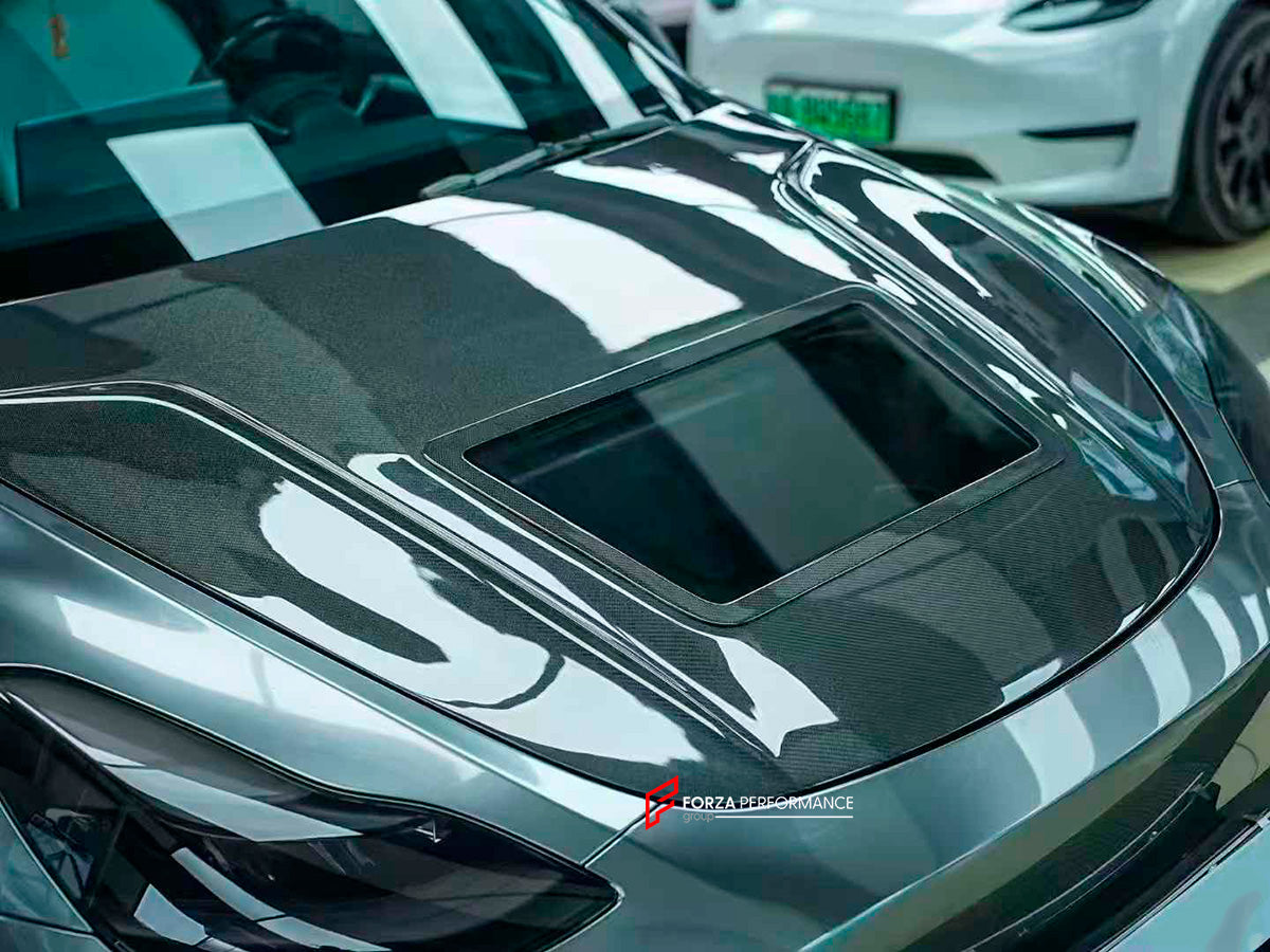 CARBON BODY KIT for TESLA MODEL Y 2020+

Set includes:

Front Lip
Hood
Rear Spoiler
Rear Diffuser

Material: Carbon

Note: Professional installation is required