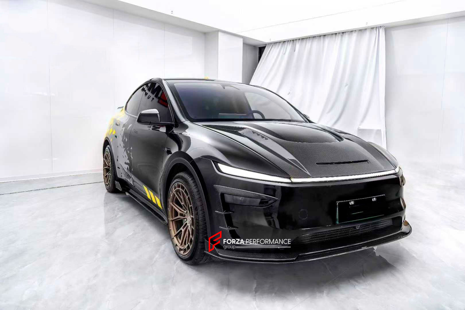 CARBON BODY KIT for TESLA MODEL Y FACELIFT 2025+

Set includes:

Front Lip

Front Bumper Canards
Hood Bonnet
Side Skirts

Rear Spoiler
Rear Diffuser

Material: Carbon

Note: Professional installation is required