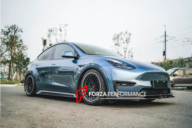 CARBON BODY KIT FOR TESLA MODEL Y 2020+

Set includes:

Front Lip

Front Bumper Canards
Side Skirts
Rear Bumper
Rear Spoiler

Material: Carbon Fiber

Note: Professional installation is required